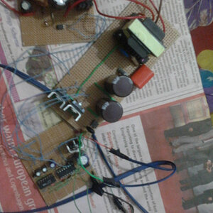 Test setup on verroboard of half-bridge converter circuit with SG3525 and IR2110 for battery charging
