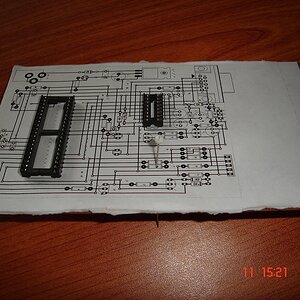 2 PCB is printed on paper and placed on components side   a pin is used to find strip cut places